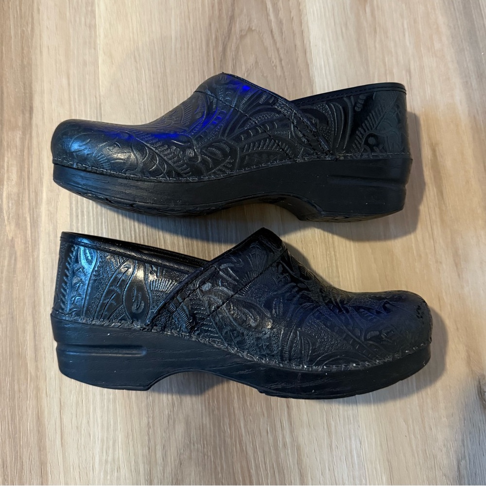 Dansko Black Floral Women's Clogs